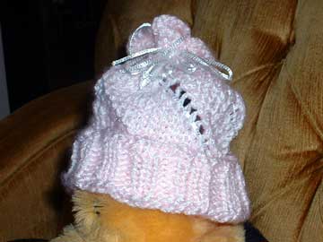 Knitted baby hat on bumblebee