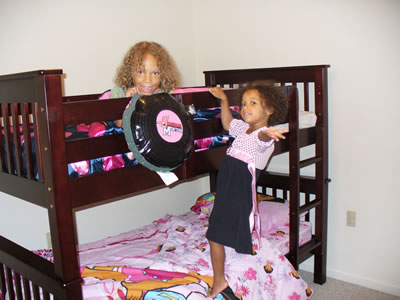 Lila and Eva posing in their new bunk bed!