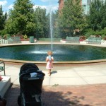 Lila at the fountain outside the Student Services Building at Michigan State University