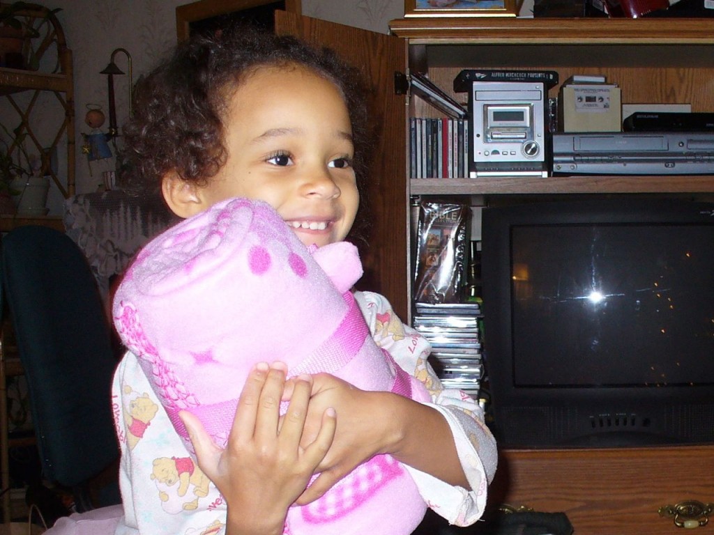 Eva excited about a present on Christmas morning