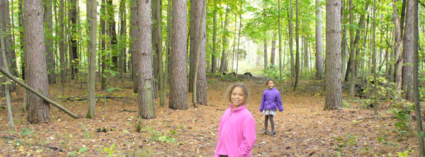 Lila and Eva pausing for a photo on the way into Ringwood Forest, near St Charles, MI.