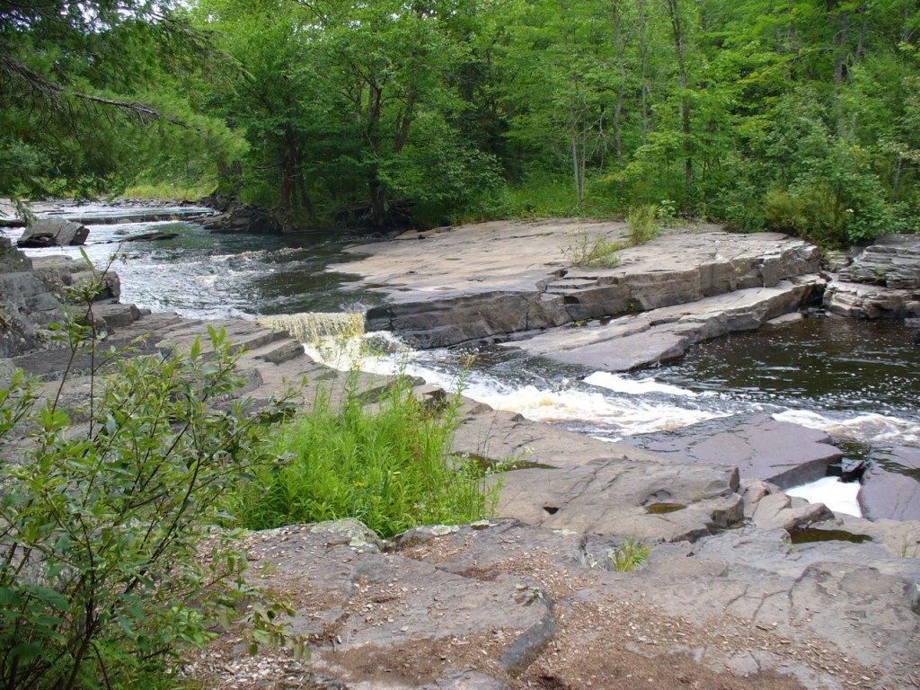 River, rocks, trees.