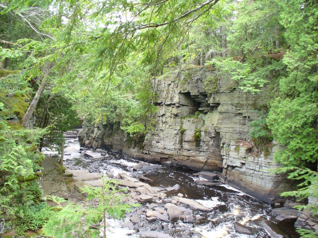 River, rocks, trees.