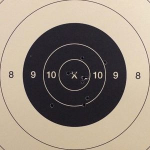 A pistol target scoring a 99 out of 100.