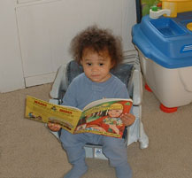 Eva "reading" a book.