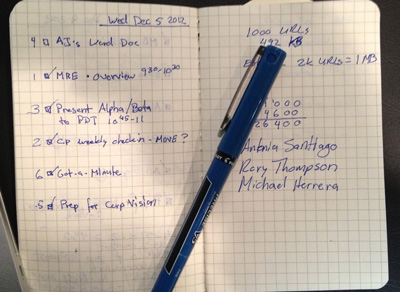 Photo of my notebook showing a prioritized daily list.